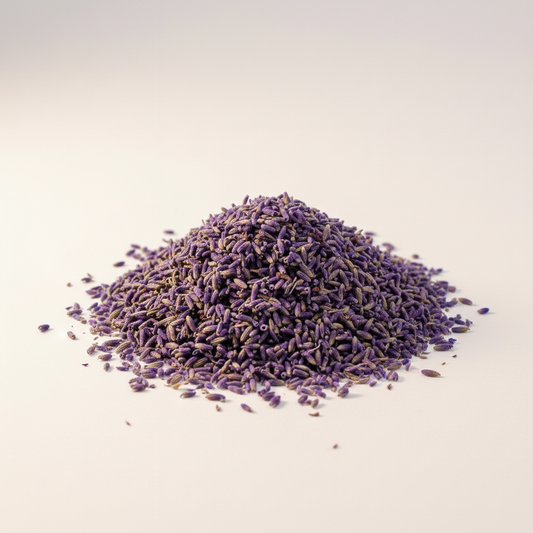 Pile of dried lavender flowers on a light beige background